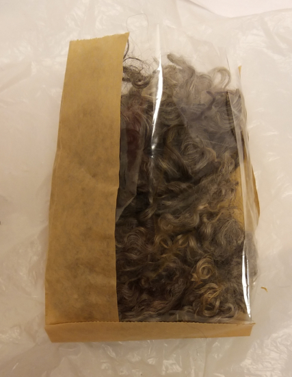 Krullig ull i påse tvättad 50g grå