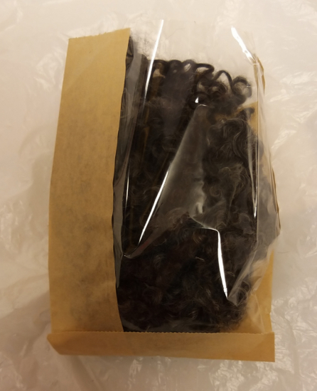 Krullig ull i påse tvättad 50g mörkgrå/svart