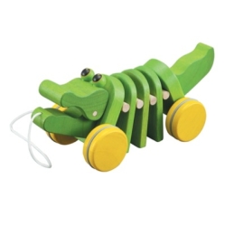 Dansande krokodil - grön dragleksak av trä från Plantoys