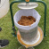 Paket: Fruktkross Manuell 9L + Stödben & Fruktpress Original 18L Krossad fruktmassa läggs i en öppen cylinderformad fruktpress i rostfritt stål med gröna detaljer