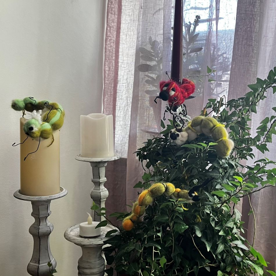 Ulldekoration-röd insekt